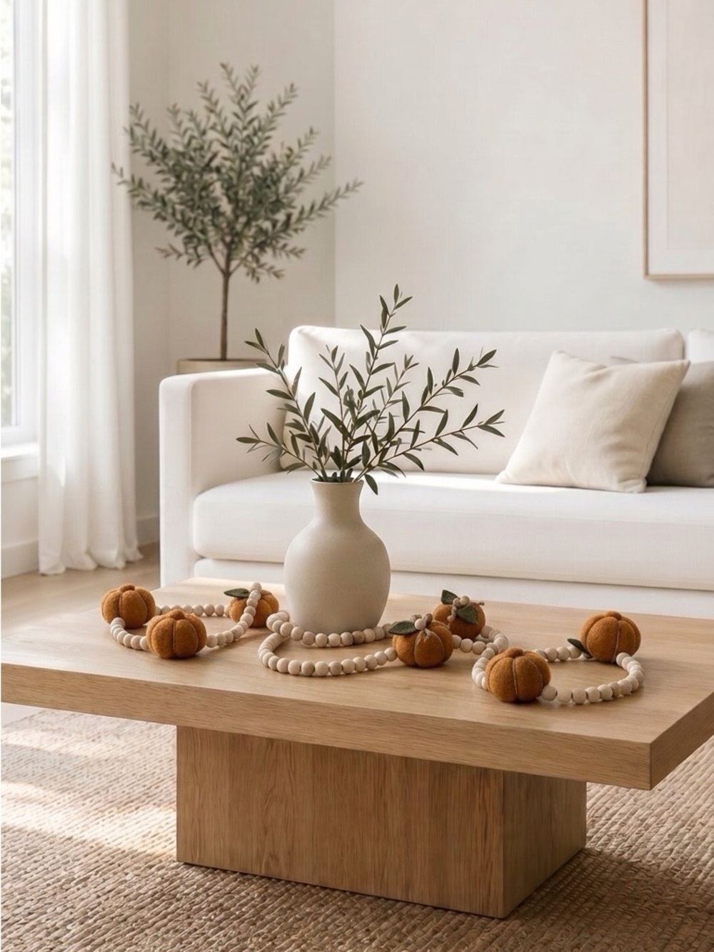 Decorative Garland with Mustard Felt Pumpkins and Wood Beads garland.